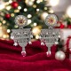 silver earrings with dangling red stones