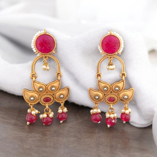 golden earrings with dangling beads