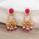 golden earrings with dangling beads